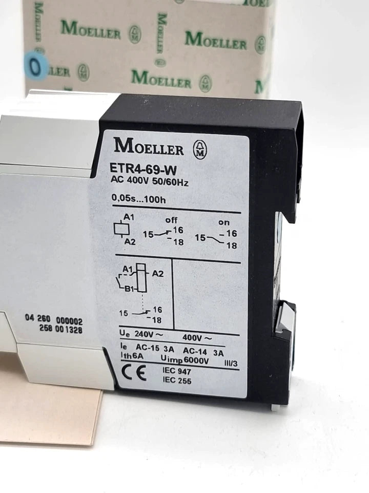 Moeller / Eaton ETR4-69-W Elektronisches Zeitrelais 400V AC, neu, originalverpackt, mit Bedienungsanleitung abgebildet.