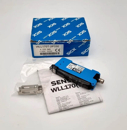 Sick 6033949 WLL170T-2P330 Lichtleiterverstärker mit Verpackung, Zubehör und Anleitung.