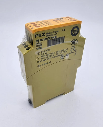 Pilz 774583 PZE X4V Kontakterweiterung 3/24VDC 4n/o fix | sealed module, original packaging, yellow device with labels visible.
