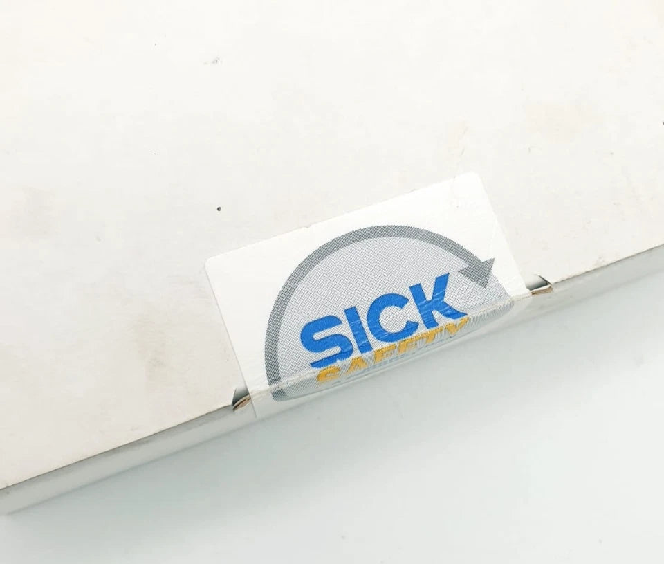 Sick 6026136 UE410-MU3T5 Sicherheitsmodul | sealed, white package with SICK logo seal showing new unopened product