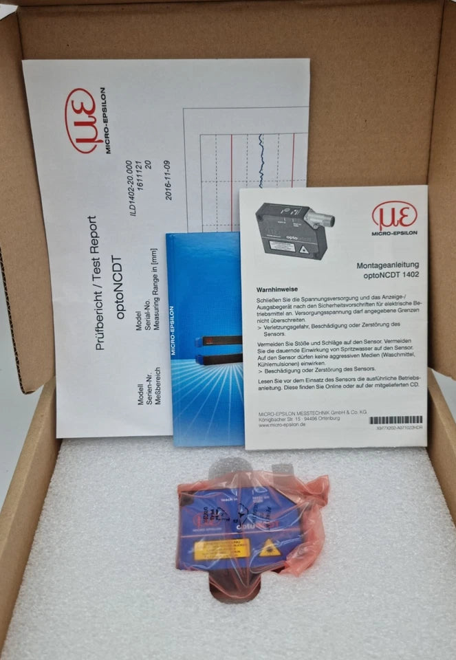 Unboxing Micro-Epsilon 4120153.000 ILD1402-20 Laser-Wegsensor Laser Distance Sensor with documentation and packaging.