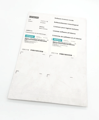 Siemens software license document with multiple languages on a white surface