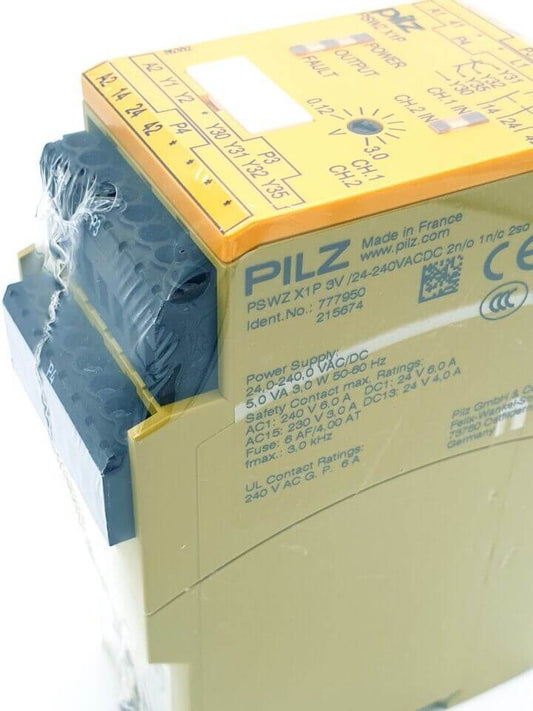 Pilz 777950 PSWZ X1P Safety Relay 3V/24-240VAC/DC, close-up view of labeling and connections, showcasing power specifications and safety features.