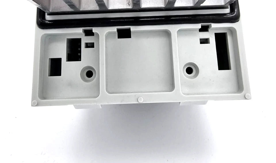 Bottom view of Lenze 13470118 ECSEA004C4B Achsmodul 4.0A showing connection ports and casing details.