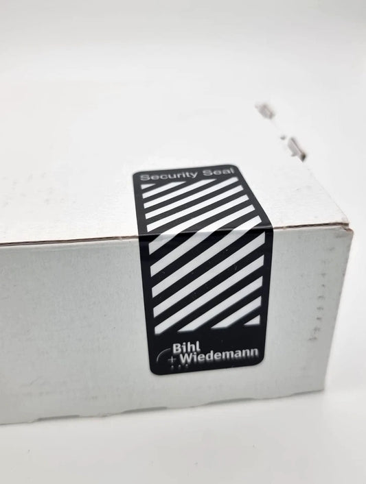 Bihl+Wiedemann BWU2578 ASi Safety E/A Modul IP20 8SE/1SA/16E 17316 | sealed box with security seal visible