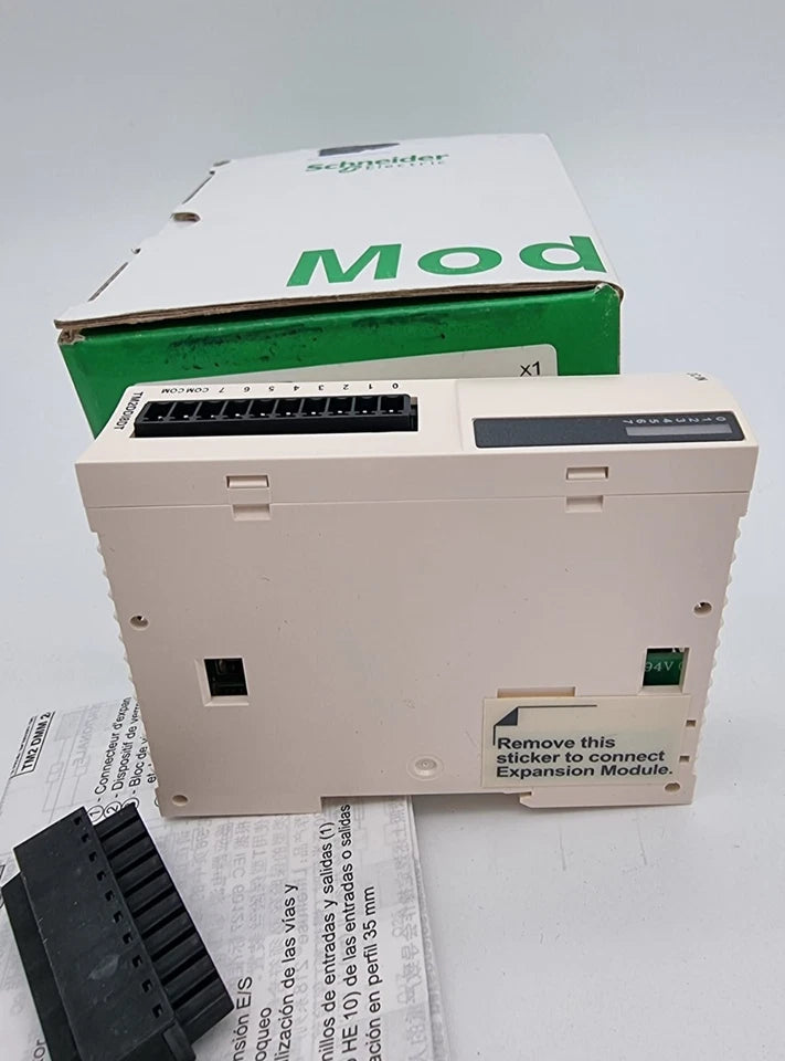 Schneider Electric TM2DDI8DT 8 Eingänge Digitales Eingangsmodul M238 for Modicon M238, shown with packaging and instructions.