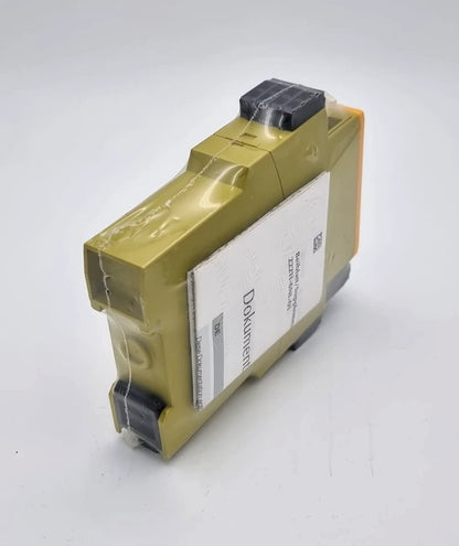 Image of Pilz 787056 PNOZ X7P C Sicherheitsschaltgerät 230-240VAC 2n/o | sealed, shown new and packaged with documents visible.