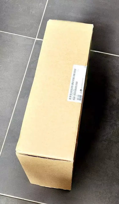 Sealed Siemens 6AV2128-3MB06-0AX0 SIMATIC HMI MTP1200 Panel in box on tiled floor.